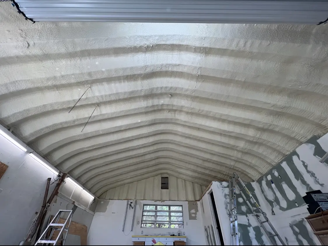 Spray polyurethane foam applied to the underside of a metal roof deck in Rosendale